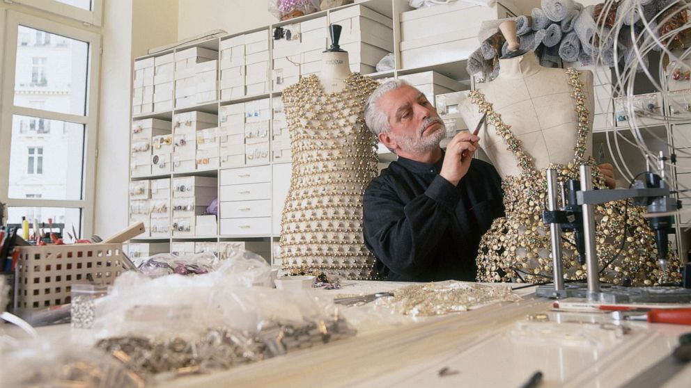 PHOTO: Fashion designer Paco Rabanne works on an outfit in his Paris workshop, April 11, 1996.