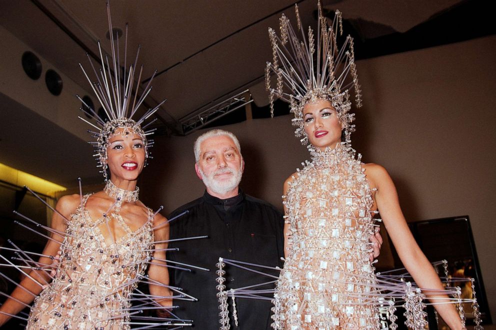 PHOTO: Fashion designer Paco Rabanne poses with models during the Paco Rabanne Haute Couture Spring/Summer 1996 show as part of Paris Fashion Week January 24, 1996 in Paris.