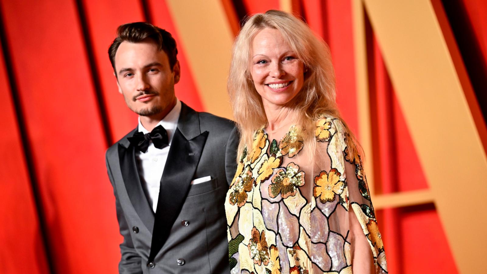 PHOTO: Brandon Thomas Lee and Pamela Anderson arrive at the Vanity Fair Oscar Party, Mar. 10, 2024, in Beverly Hills.