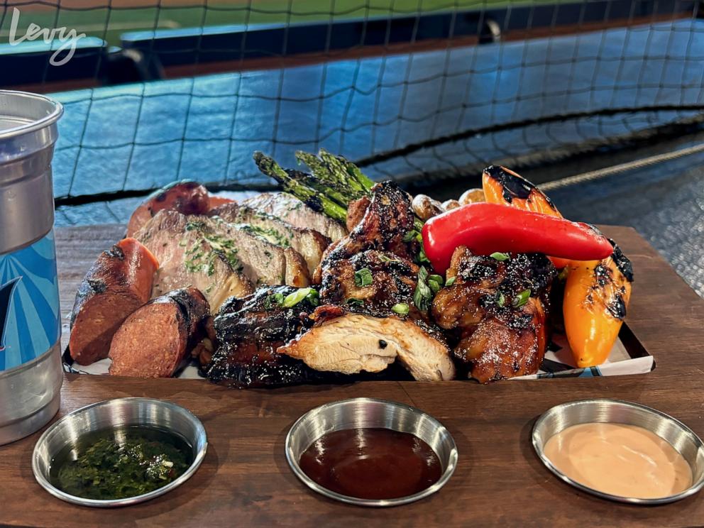 PHOTO: A Parrillada Board with steak, chicken, sausage and vegetables served at loanDepot park.