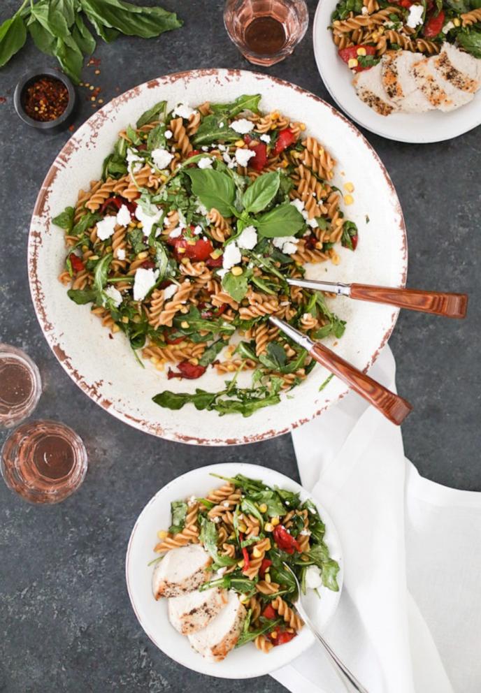 PHOTO: A large bowl of pasta salad with roasted vegetables.