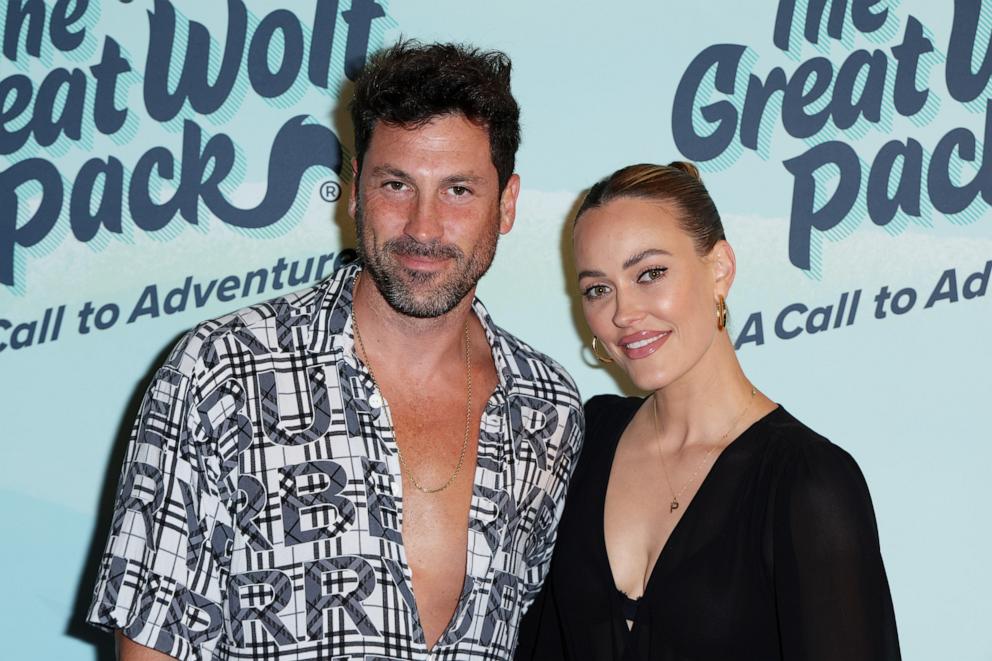 PHOTO: Maksim Chmerkovskiy, left, and Peta Murgatroyd attend Great Wolf Lodge's “The Great Wolf Pack: A Call to Adventure” red carpet event at Great Wolf Lodge, Aug. 23, 2022, in Garden Grove, Calif.