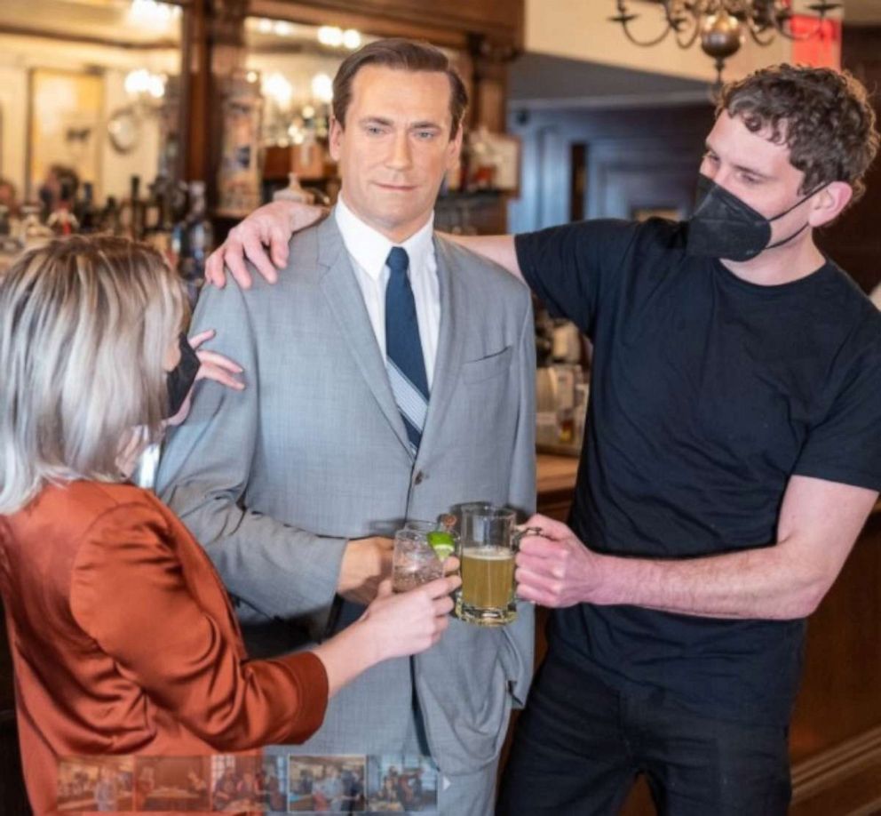 PHOTO: A wax figure of Jon Hamm at the bar inside Peter Luger Steak House.