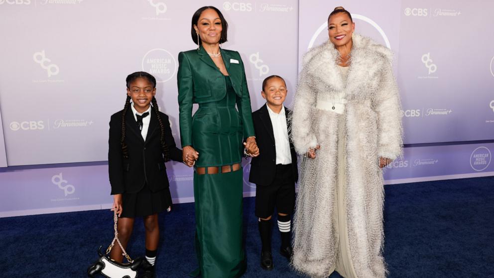 PHOTO: Queen Latifah and Eboni Nichols with Kaavia Wade and Rebel attend the 52nd American Music Awards, May 25, 2026 in Las Vegas.
