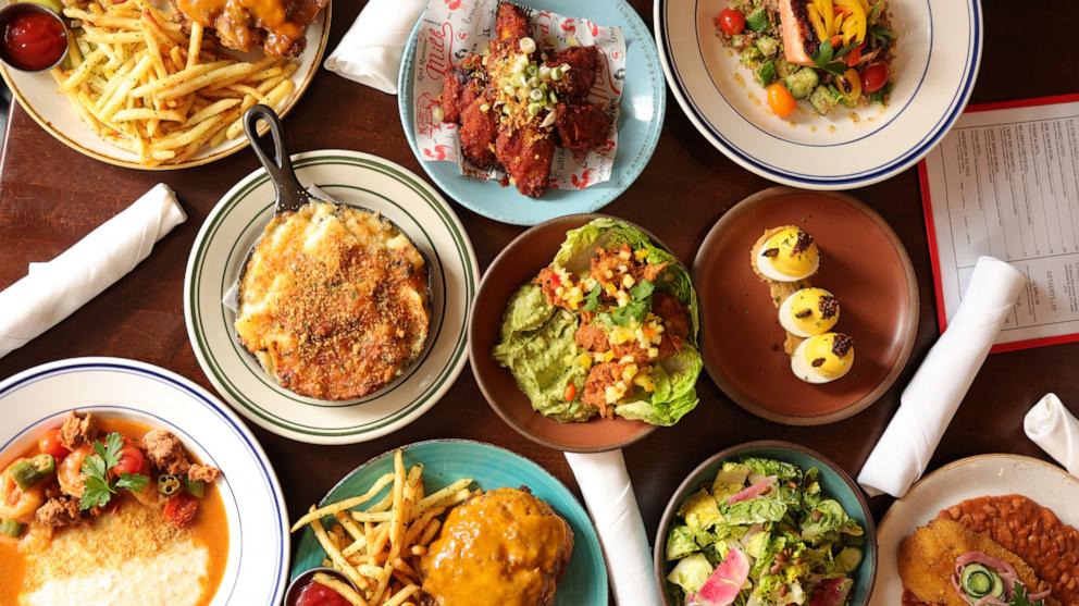 PHOTO: An assortment of classic dishes from mac and cheese to deviled eggs and fried chicken wings at Red Rooster in Harlem, New York City.