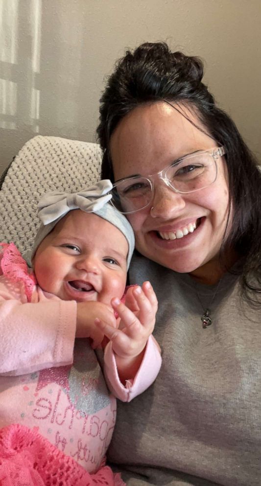 PHOTO: Hannah Brand of Nebraska holds her baby daughter, Patynn.