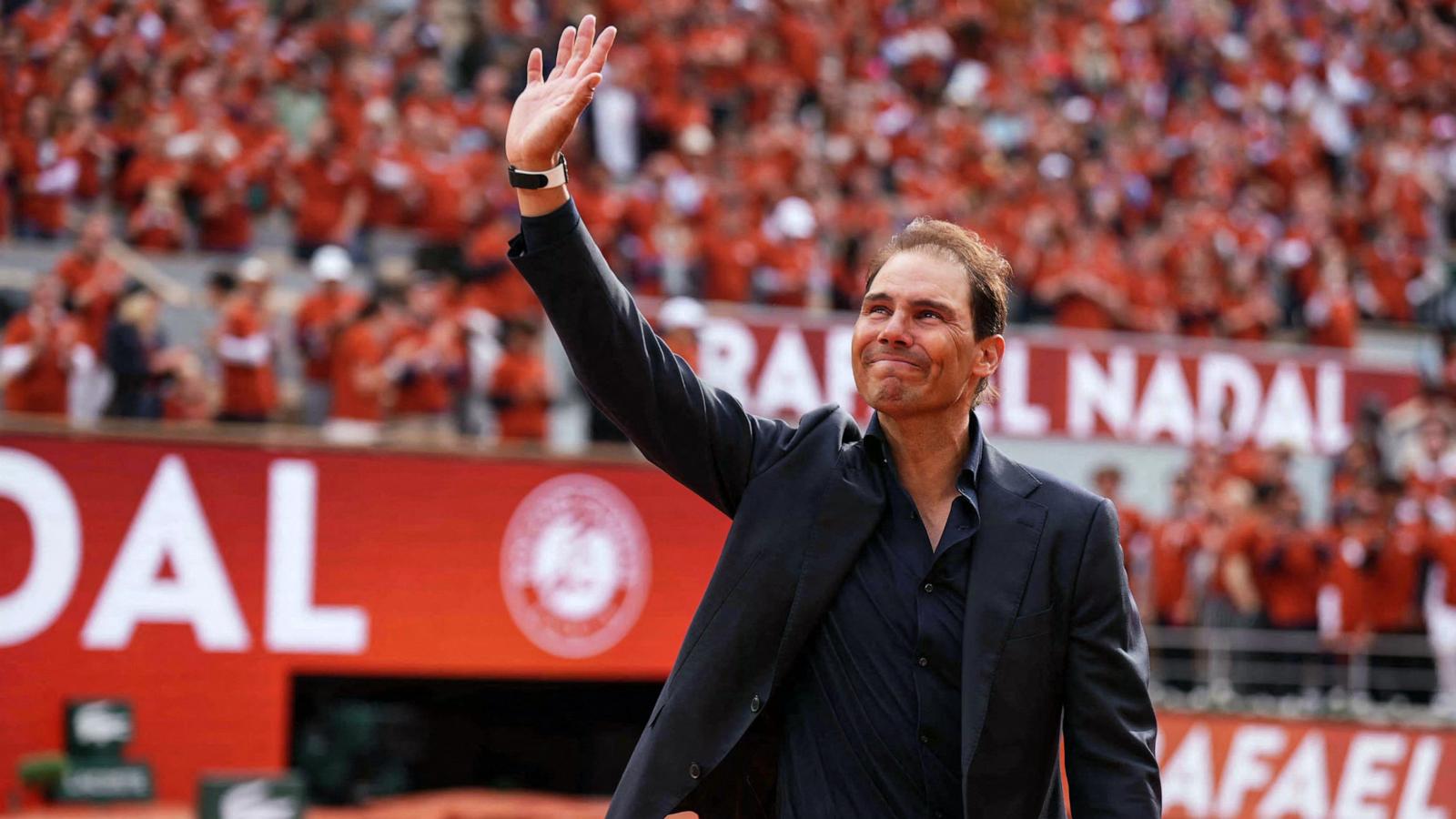 PHOTO: Former Spanish player Rafael Nadal waves to the crowd during a ceremony honoring his career during the French Open tennis tournament on Court Philippe-Chatrier at the Roland-Garros Complex in Paris, May 25, 2025.