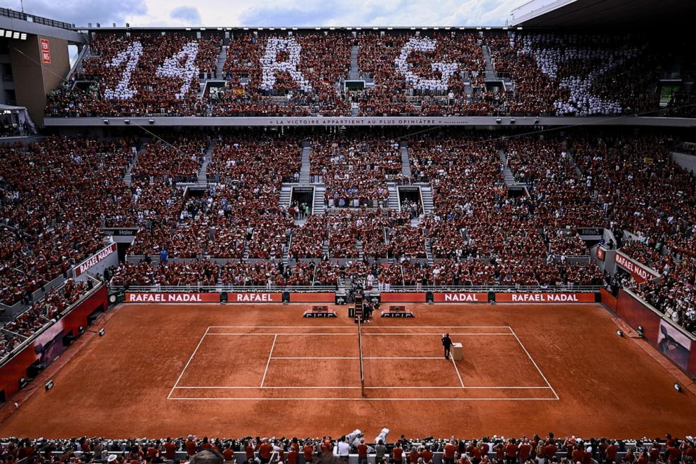PHOTO: Former Spanish player Rafael Nadal attends a ceremony honoring his career during the French Open tennis tournament on Court Philippe-Chatrier at the Roland-Garros Complex in Paris, May 25, 2025.