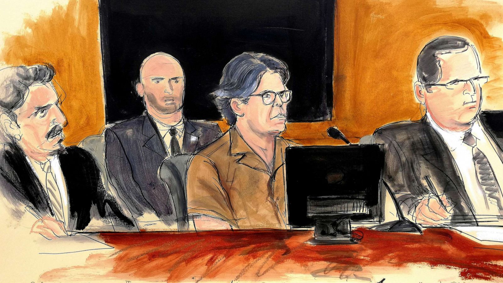 PHOTO: In this April 13, 2018 courtroom sketch Keith Raniere, second from right, leader of the secretive group NXIVM, attends a hearing at court in the Brooklyn borough of New York.