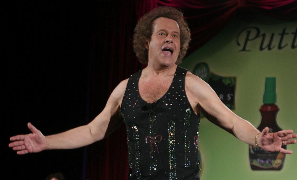 PHOTO: In this June 2, 2006 file photo, Richard Simmons speaks to the audience before the start of a summer salad fashion show at Grand Central Terminal in New York.