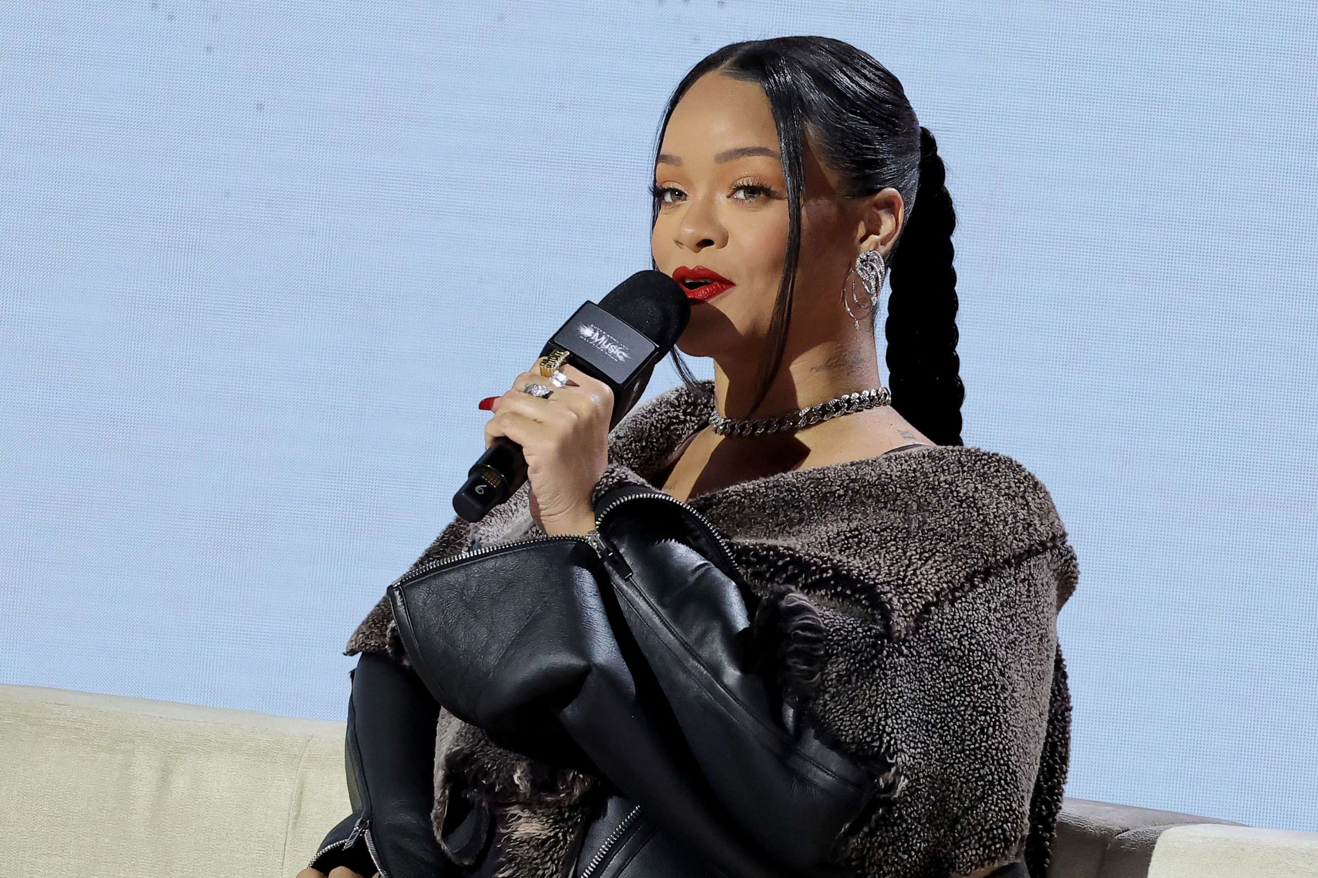PHOTO: Rihanna speaks onstage during the Super Bowl LVII Pregame & Apple Music Super Bowl LVII Halftime Show Press Conference at Phoenix Convention Center, Feb. 9, 2023, in Phoenix.