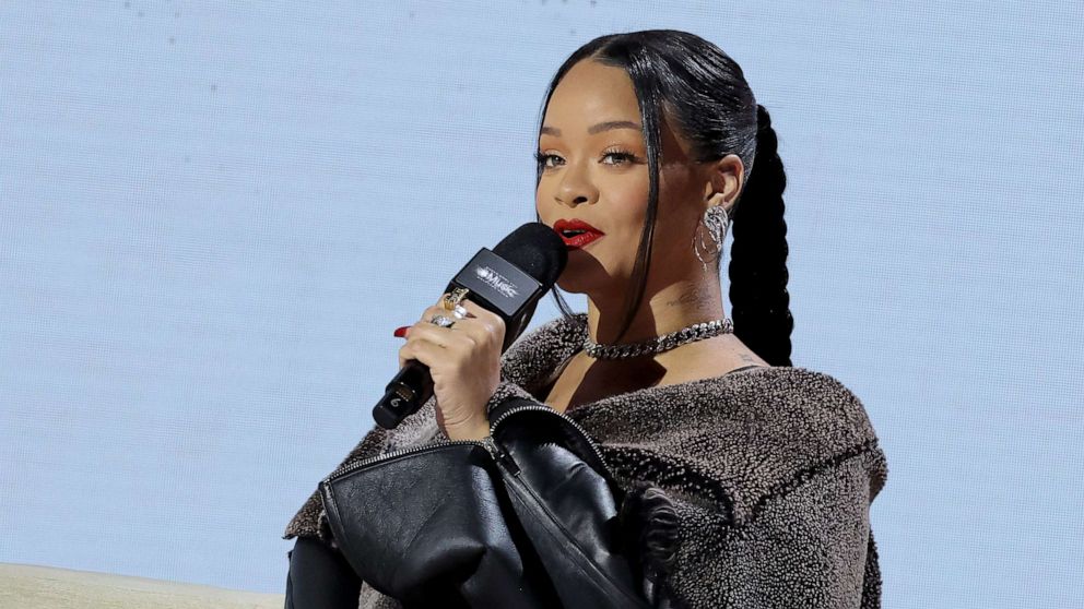 PHOTO: Rihanna speaks onstage during the Super Bowl LVII Pregame & Apple Music Super Bowl LVII Halftime Show Press Conference at Phoenix Convention Center, Feb. 9, 2023, in Phoenix.