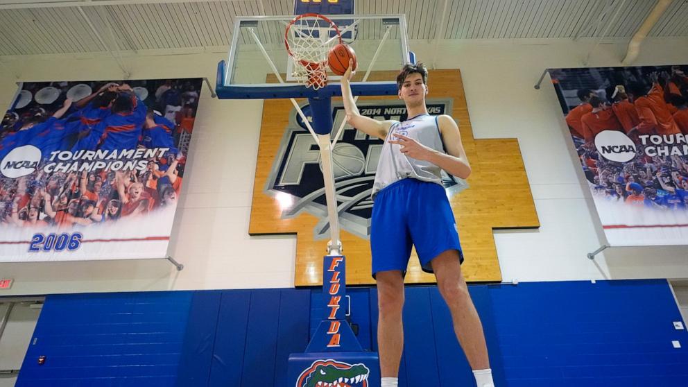 PHOTO: Olivier Rioux, 7-foot-9 NCAA college basketball player at Forida, poses after practice, Oct. 18, 2024 in Gainesville, Fla. 