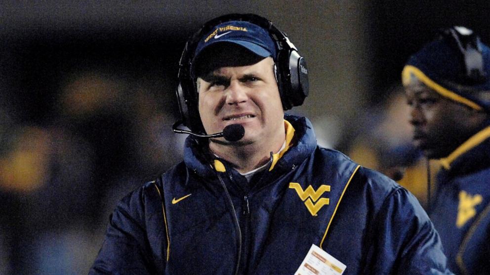 PHOTO: West Virginia coach Rich Rodriguez walks the sideline late in the second half during a 13-9 loss to Pittsburgh in a college football game, Dec. 1, 2007, in Morgantown, W.Va. 