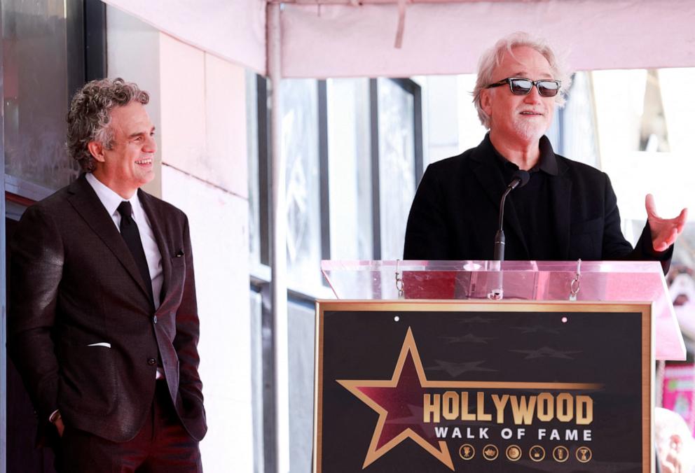 PHOTO: Film director David Fincher speaks at the Hollywood Walk of Fame ceremony honoring actor Mark Ruffalo (L) in Los Angeles on Feb. 8, 2024.