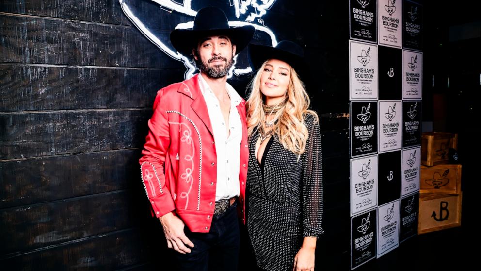 PHOTO: Ryan Bingham and Hassie Harrison attend Bingham's Bourbon NFR After Party in Las Vegas, NV, Dec. 7, 2023. 