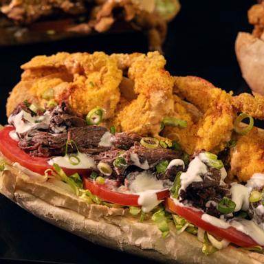 PHOTO: A surf and turf po' boy being served at Super Bowl LIX at Caesars Superdome.