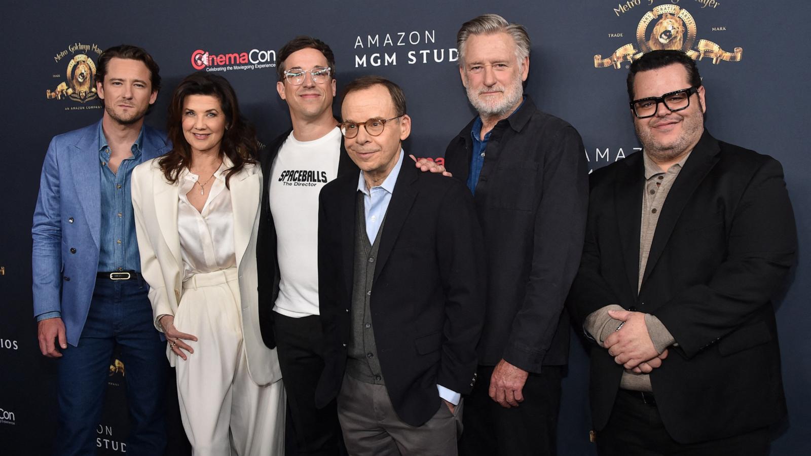 PHOTO: Actors Lewis Pullman, Daphne Zuniga, director Josh Greenbaum, actors Rick Moranis, Bill Pullman and Josh Gad promote the upcoming film "Spaceballs: The New One" during the Amazon MGM Studios photo call during CinemaCon on April 15, 2026.