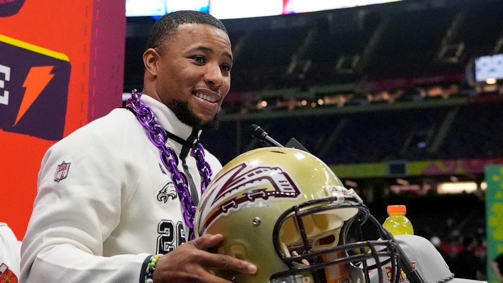 PHOTO: Philadelphia Eagles running back Saquon Barkley participates during Super Bowl 59 Opening Night,, Feb. 3, 2025, in New Orleans.