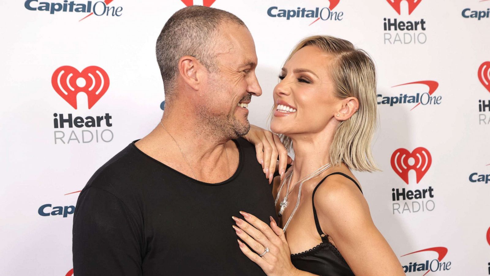 PHOTO: Brian Austin Green and Sharna Burgess attend the 2023 iHeartRadio Music Festival at T-Mobile Arena on Sept. 22, 2023 in Las Vegas.