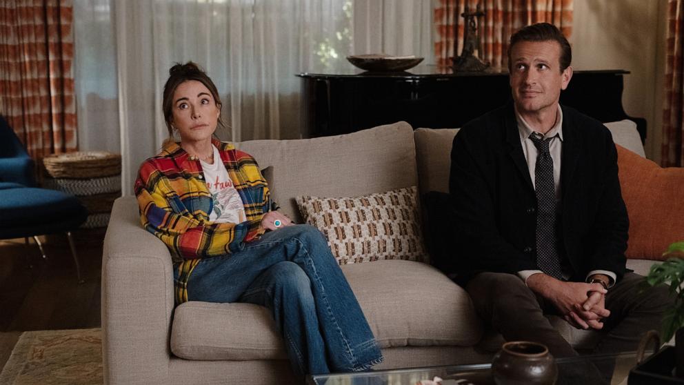 PHOTO: Christa Miller and Jason Segel appear in an episode of "Shrinking," streaming on Apple TV+.