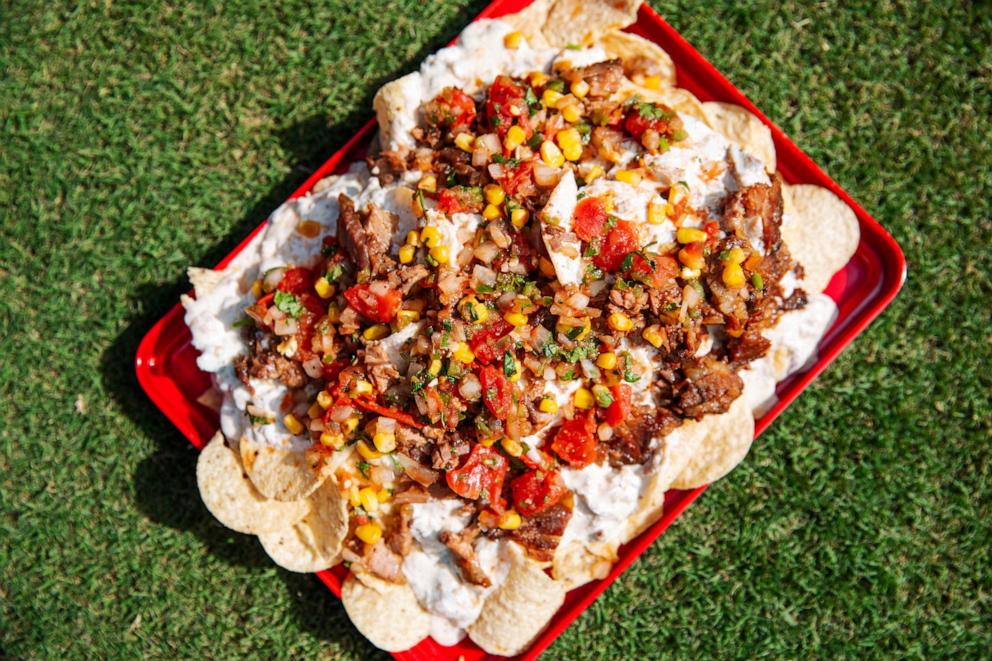 PHOTO: A platter of smoked brisket nachos will be served to Chiefs fans inside GEHA Field at Arrowhead Stadium.