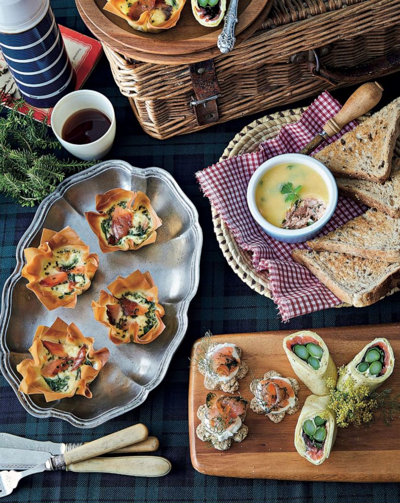 PHOTO: A spread of savory pastries and bites for afternoon tea with smoked salmon asparagus and cream cheese wraps.