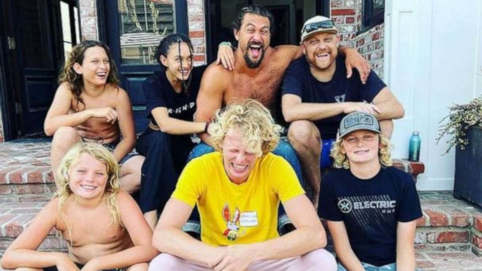 PHOTO: Travis Snyder, far right, poses with his friend actor Jason Momoa and their children.