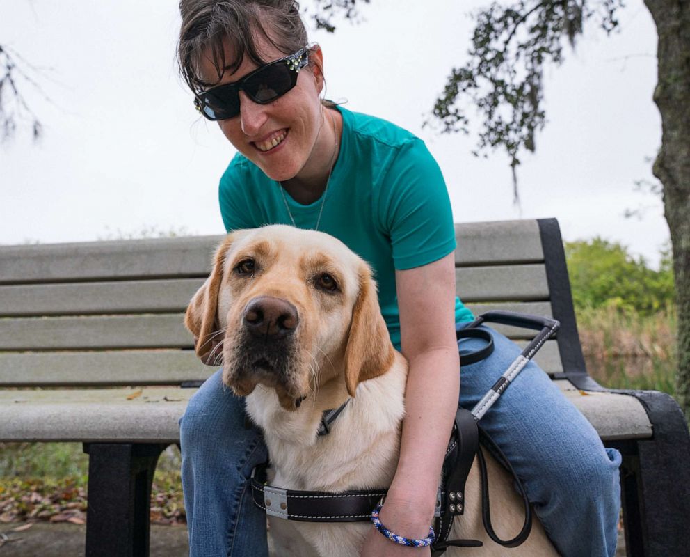 PHOTO: Jessica Woods with her guide dog Rubi.