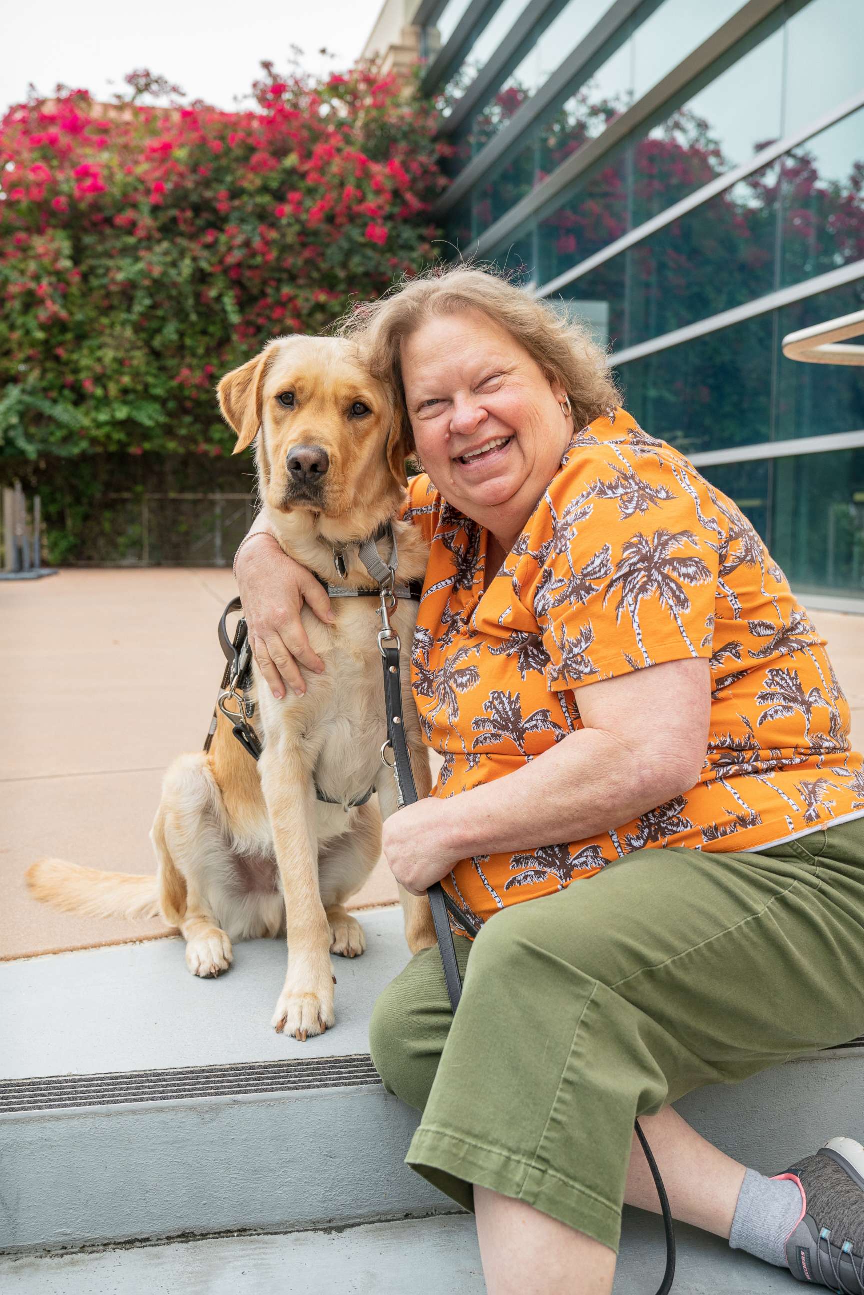 PHOTO: Lynn Puckett with her guide dog AJ.