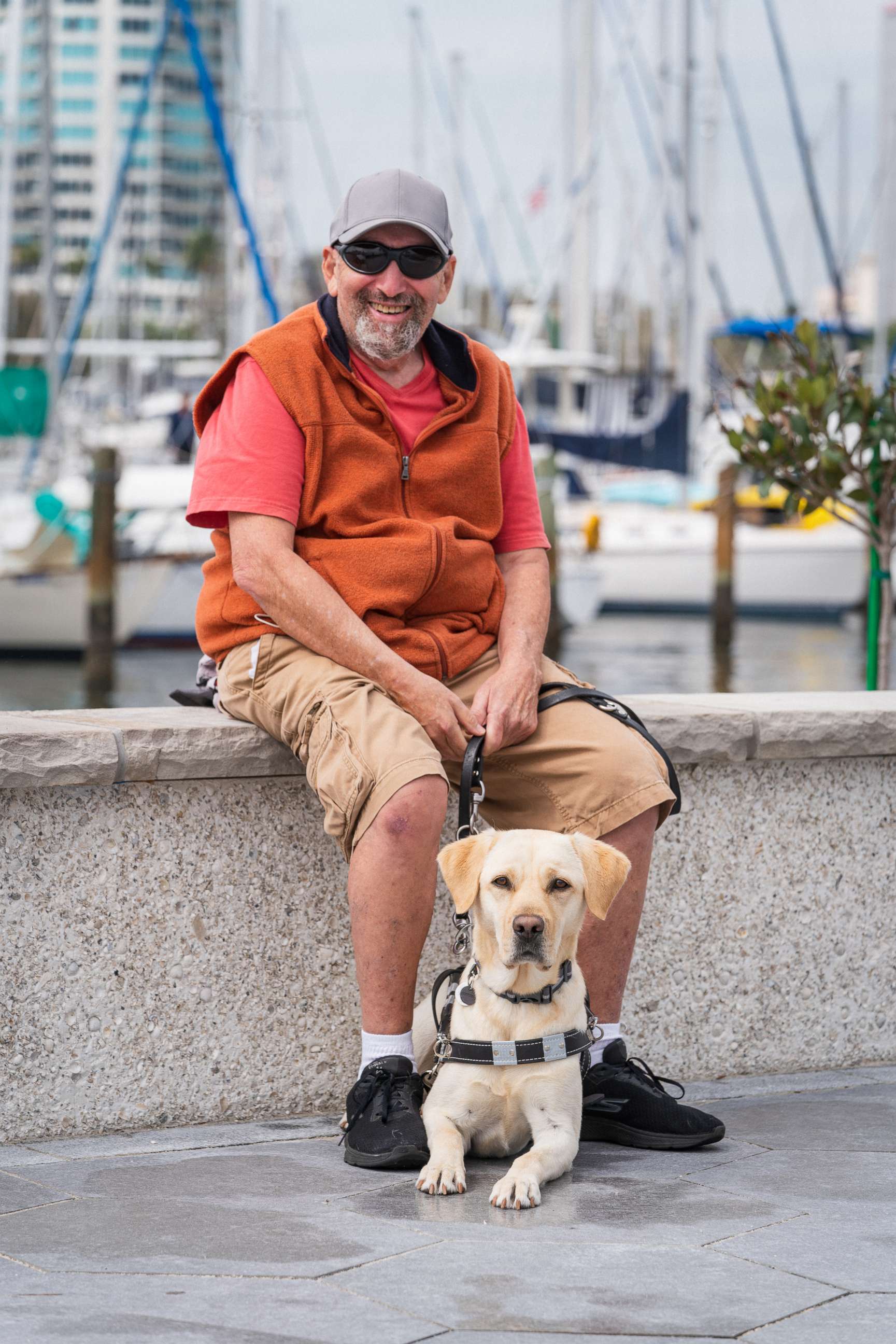 PHOTO: Sanford Steinberg with his guide dog Alfie.