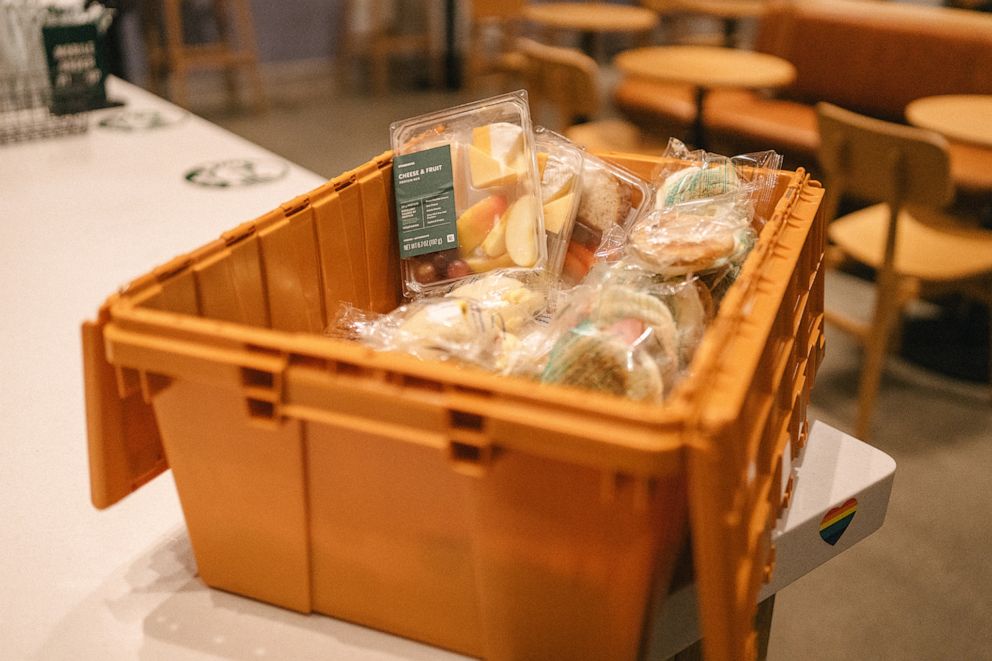 PHOTO: A bin of Starbucks food products to be donated.