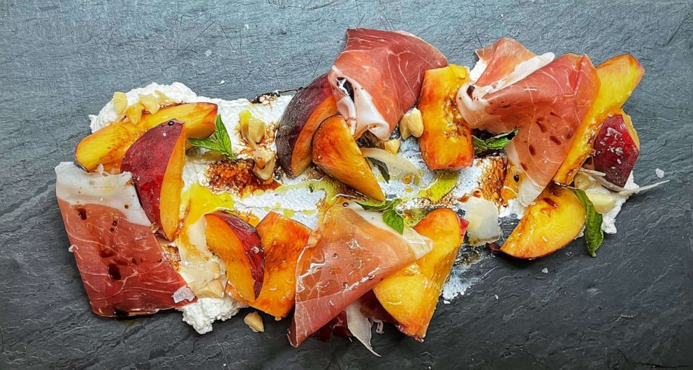 PHOTO: A plate of summer peaches wih Proscuitto and ricotta.