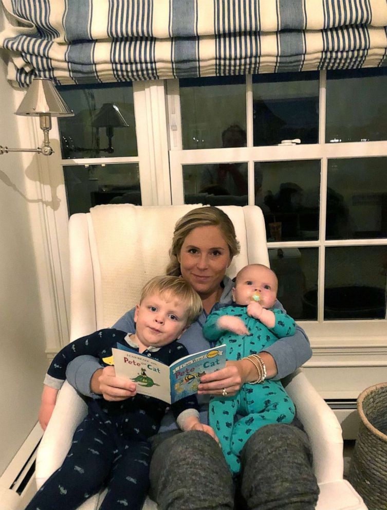 PHOTO: Sydney Williams, of Greenwich, Conn., reads a book to her two sons.