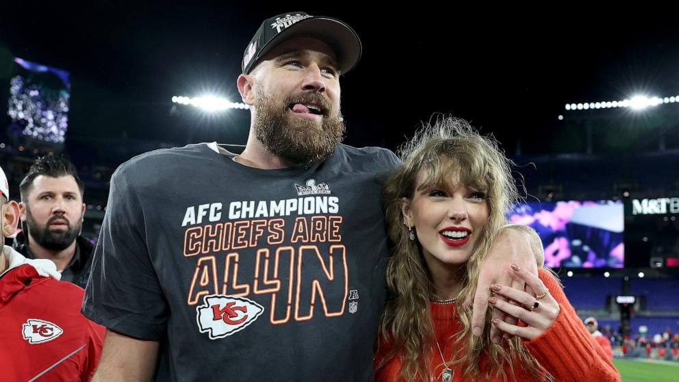 PHOTO: Travis Kelce #87 of the Kansas City Chiefs celebrates with Taylor Swift after a 17-10 victory against the Baltimore Ravens in the AFC Championship Game at M&T Bank Stadium on January 28, 2024 in Baltimore, Maryland. 