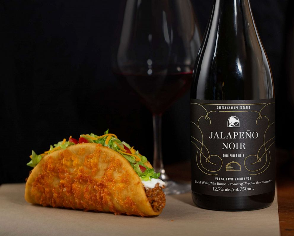 PHOTO: An aged-cheddar chalupa and Jalapeno Noir wine from Taco Bell in Canada.