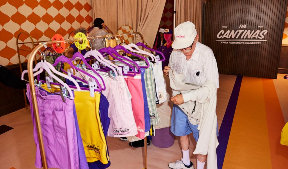 PHOTO: Eugene from Retirement House shops for unique thrifted items at The Cantinas sundries shop.