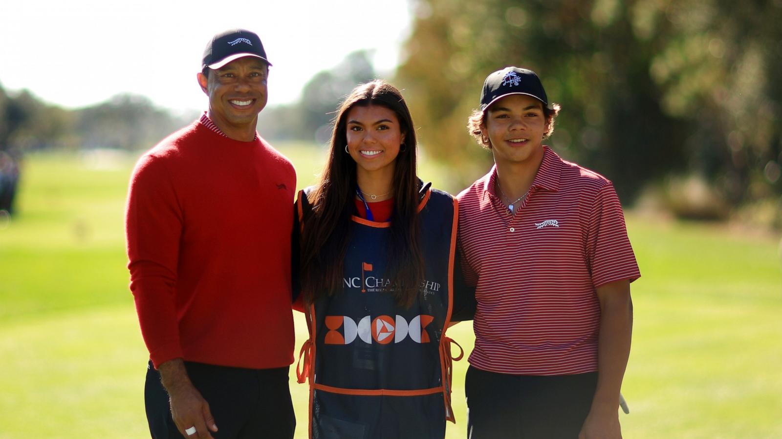 PHOTO: Tiger Woods, son Charlie Woods, and daughter Sam Woods stand on the first tee during the second round of the PNC Championship at Ritz-Carlton Golf Club in Orlando, Fla., Dec. 22, 2024.