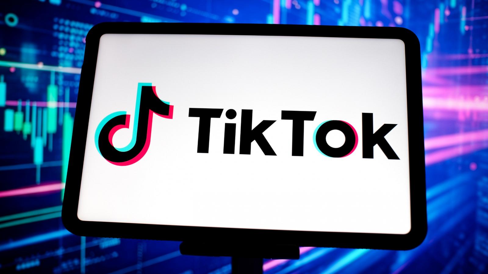 In this photo illustration, the TikTok logo is displayed on the screen of a tablet.