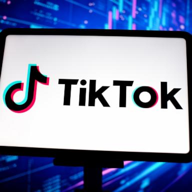 In this photo illustration, the TikTok logo is displayed on the screen of a tablet. 