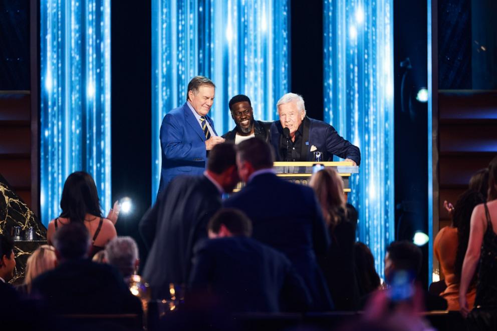 PHOTO: Bill Belichick, Kevin Hart and Robert Kraft speak onstage during G.R.O.A.T The Greatest Roast Of All Time: Tom Brady for the Netflix is a Joke Festival In Inglewood, CA, May 05, 2024.