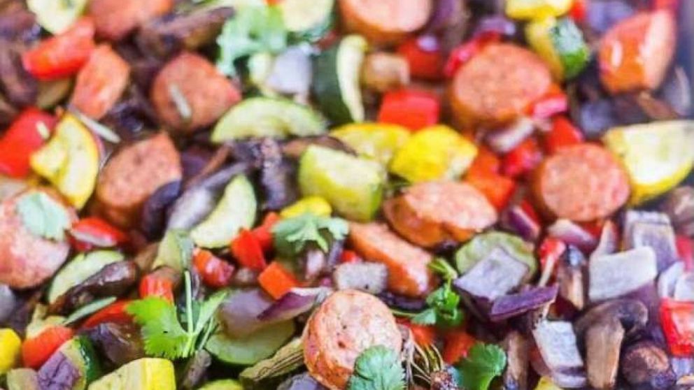 A sheet pan dinner of sausage and mixed veggies.