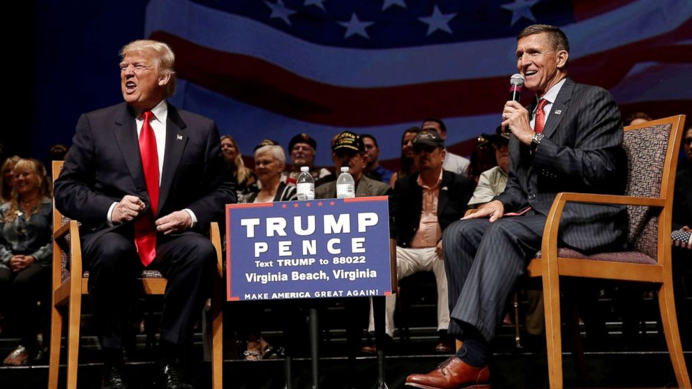 PHOTO: Republican presidential nominee Donald Trump speaks alongside retired U.S. Army Lieutenant  General Mike Flynn during a campaign town hall meeting in Virginia Beach, Va., Sept. 6, 2016.