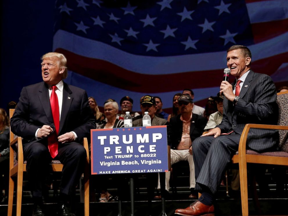 PHOTO: Republican presidential nominee Donald Trump speaks alongside retired U.S. Army Lieutenant General Mike Flynn during a campaign town hall meeting in Virginia Beach, Va., Sept. 6, 2016.