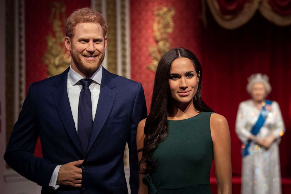 PHOTO: The figures of Britain's Prince Harry and Meghan, Duchess of Sussex, left, are moved from their original positions at Madame Tussauds in London, Jan. 9, 2020. 