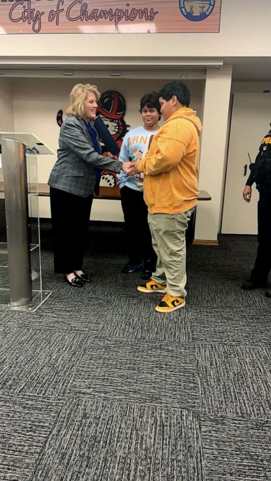 PHOTO: Kathy Catazaro-Perry, the mayor of Massillon, Ohio, recognized Jermel and Jordan Taylor and presented them with pins during a March 6 ceremony.
