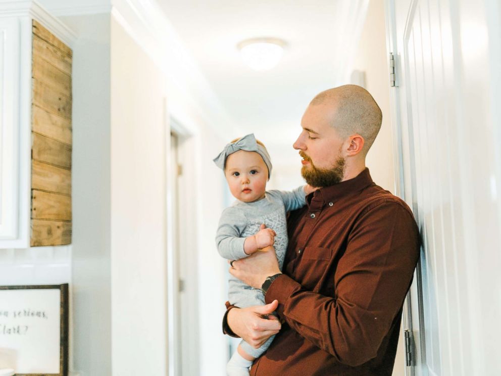 PHOTO: Kevin McAlpin, 28, holds his daughter, Isla.