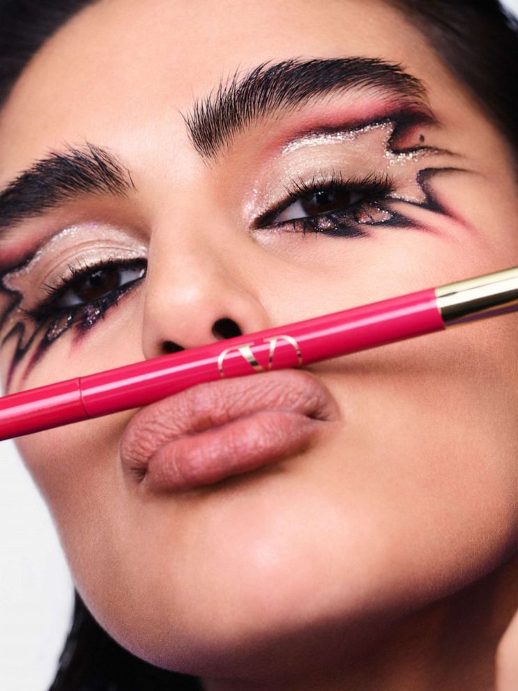 PHOTO: Model poses with a liner pencil from the Valentino Beauty collection. 