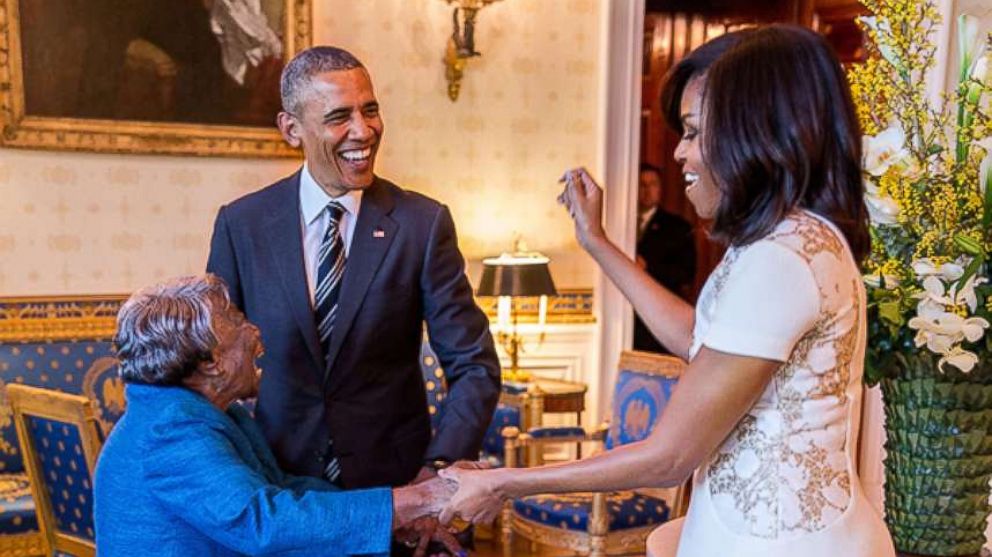 PHOTO: President Barack Obama watches First Lady Michelle Obama dance with 106-year-old Virginia McLaurin in the Blue Room of the White House prior to a reception celebrating African American History Month, Feb. 18, 2016.