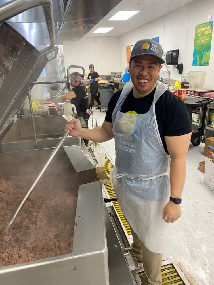 PHOTO: A volunteer helps cook food for World Central Kitchen in Florida.